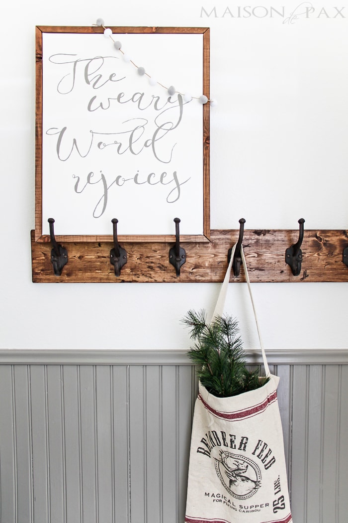 DIY Christmas sign: learn how to make your own beautiful hand painted sign on canvas framed with a simple wooden frame | aiweb9ygdry.cmersite.com