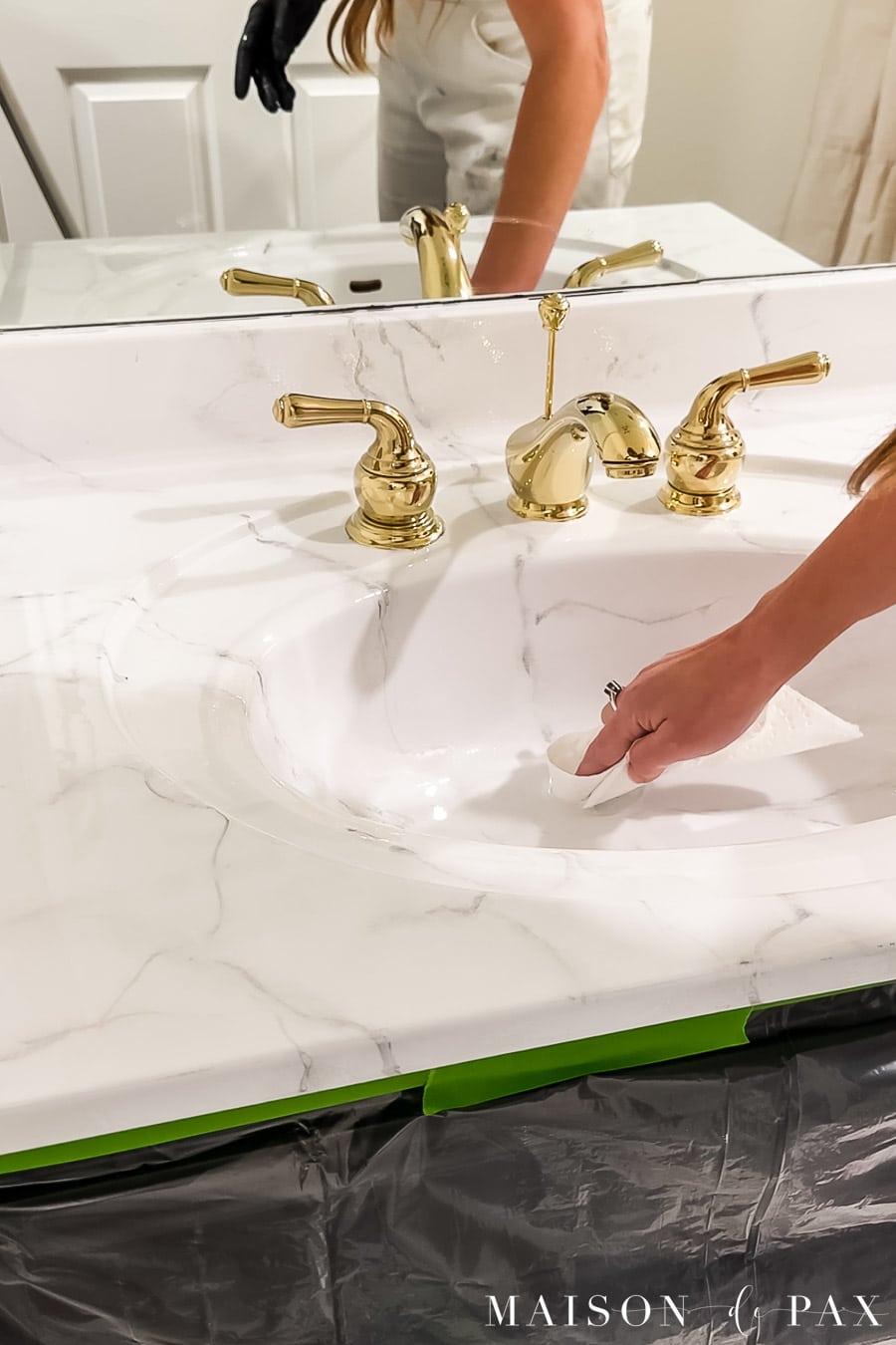 wipe epoxy before it runs over your drain trim when sealing countertops