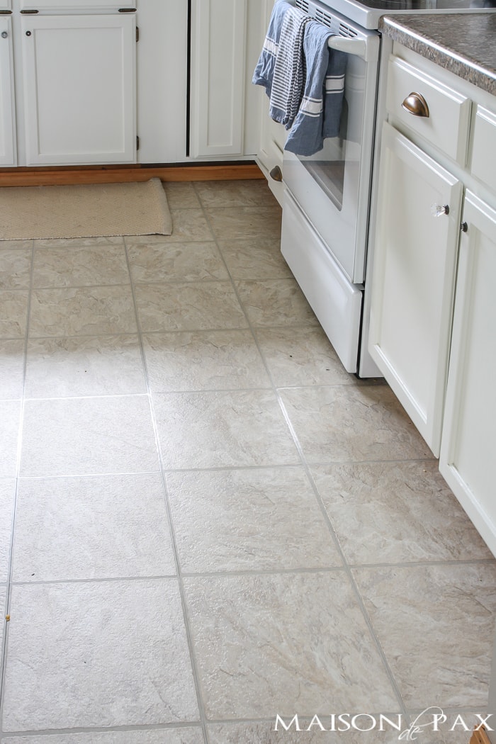 Tired of your old linoleum floors?!?! Try this incredible budget-friendly transformation to get wood-look floors perfect for high-traffic areas!