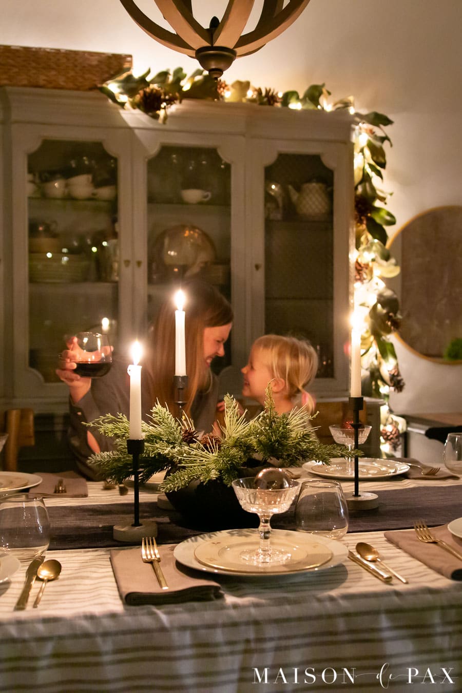 mother and daughter enjoying Christmas dinner
