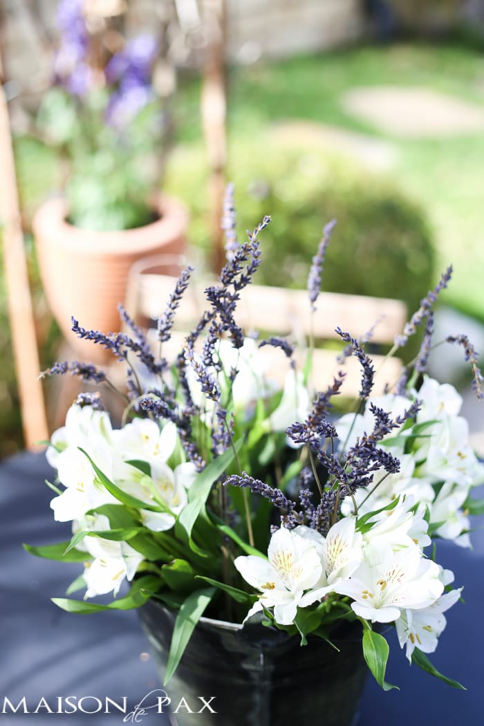 lavender and alstroemeria in a rustic bucket - such a simple and elegant centerpiece | aiweb9ygdry.cmersite.com