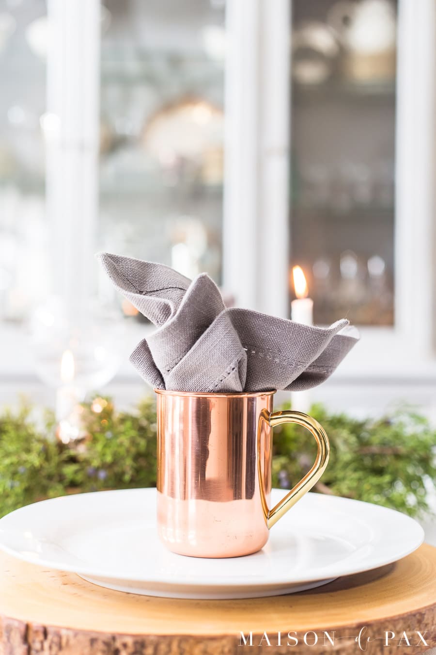 copper moscow mule mug stuffed with gray napkin 