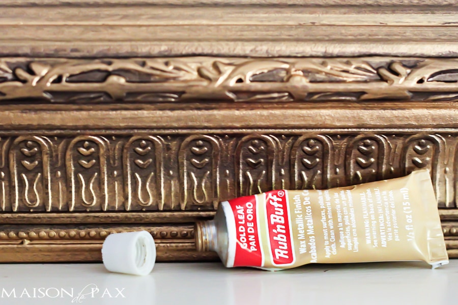 gold leaf rub 'n buff transforms a dark mirror