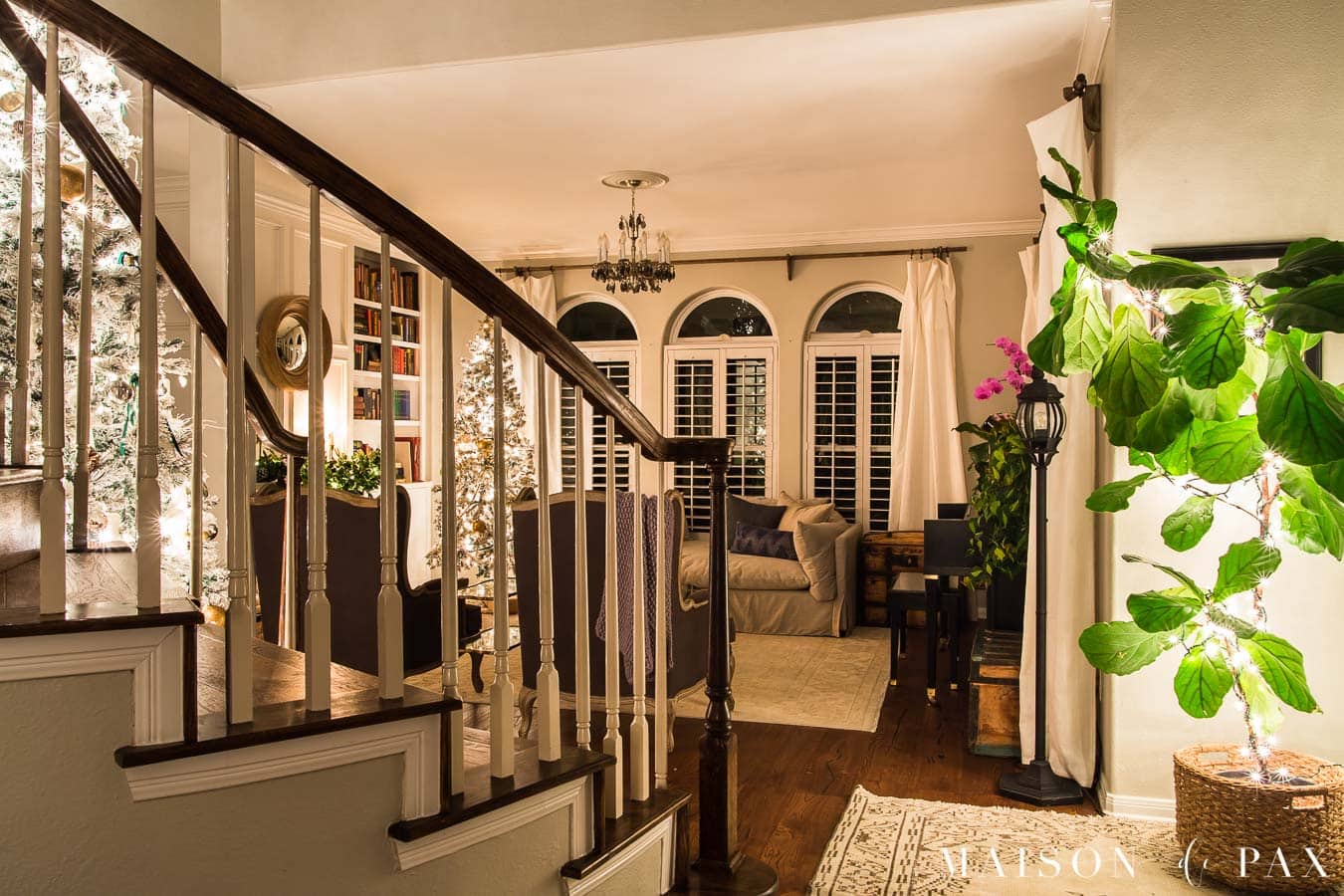staircase and entryway with Christmas lights | Maison de Pax