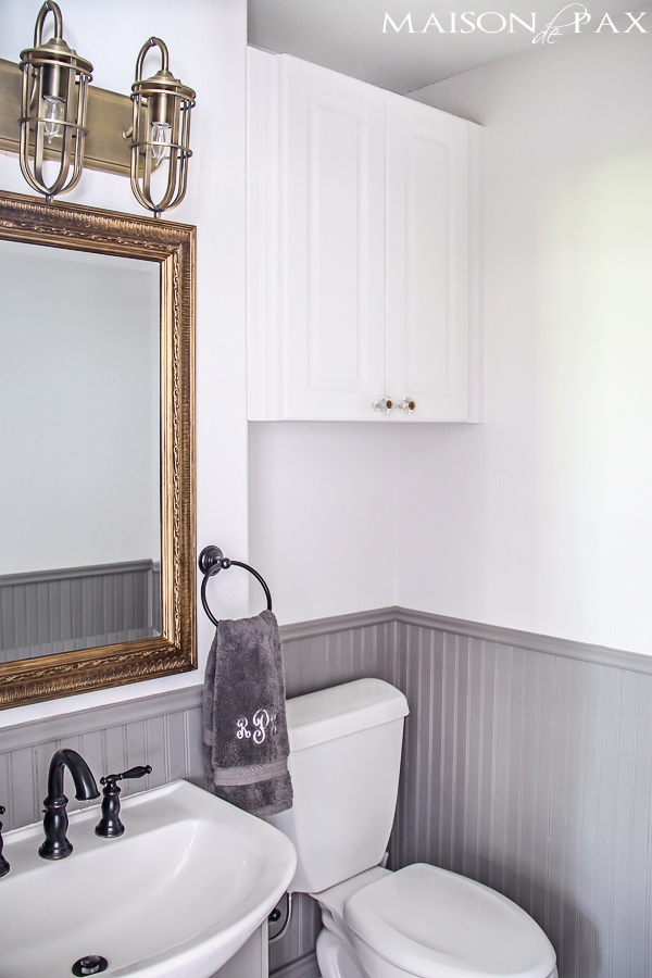 Small powder bathroom in gray and white- Maison de Pax