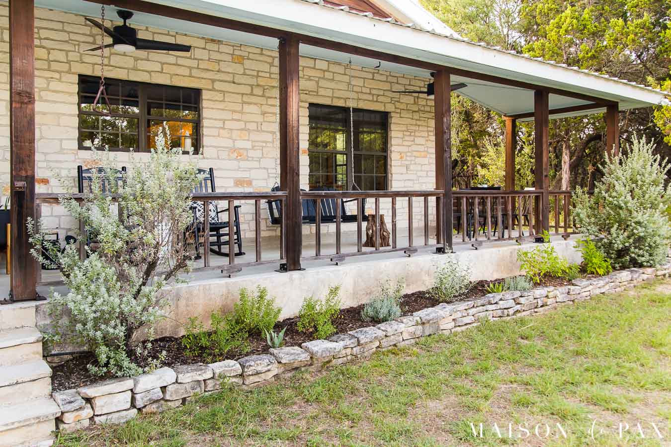 drought resistant landscaping with rock lined beds | Maison de Pax