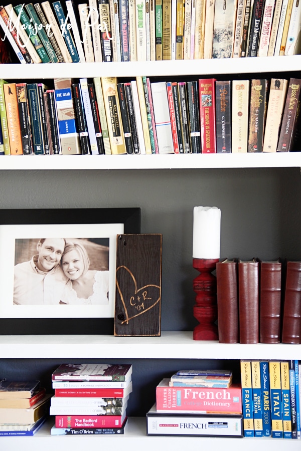 Ideas for layering bookshelf decor with an adorable rustic wood sign... plus a giveaway!