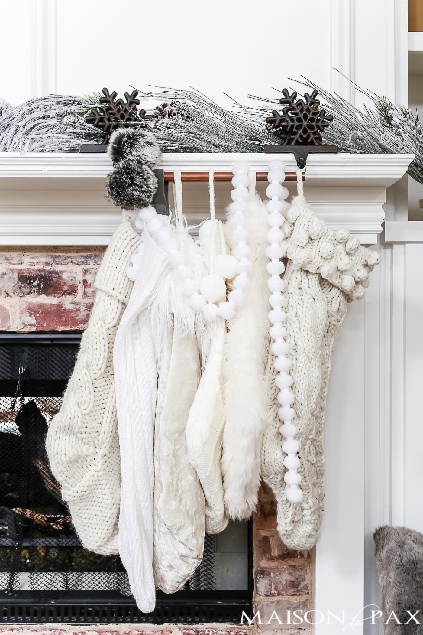 brilliant! Learn how to hang your stockings from a piece of copper pipe to simplify your Christmas decorating or save space if your holiday decor needs to be small #christmasstockings