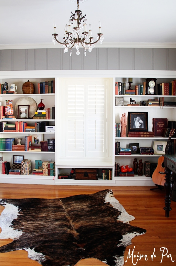 choosing the right color: a soft, warm gray brings light and comfort to a paneled office