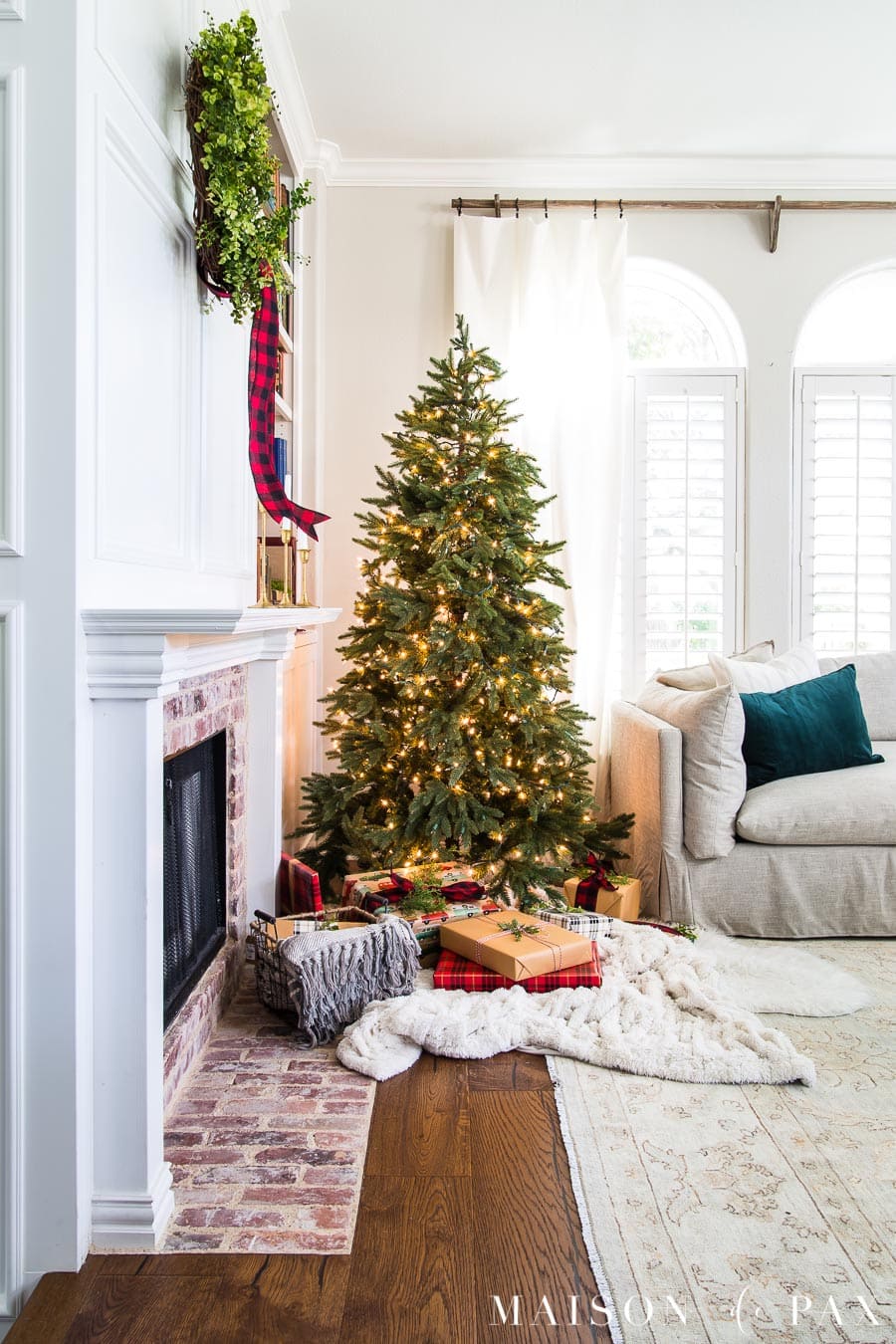 naked holiday tree with red and black plaid ribbon and wrapping paper | Maison de Pax