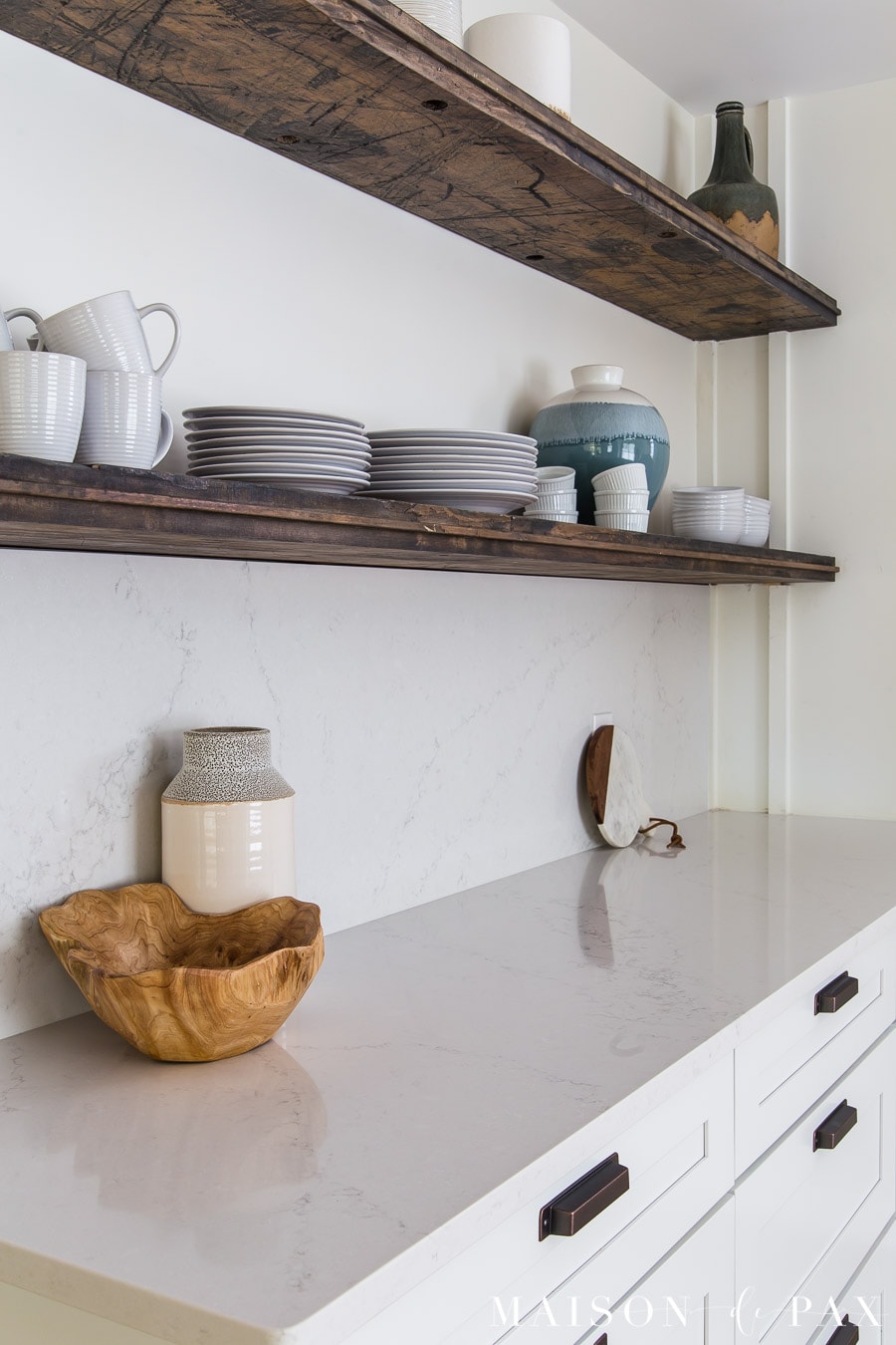 reclaimed wood floating shelves above quartz kitchen counters | Maison de Pax