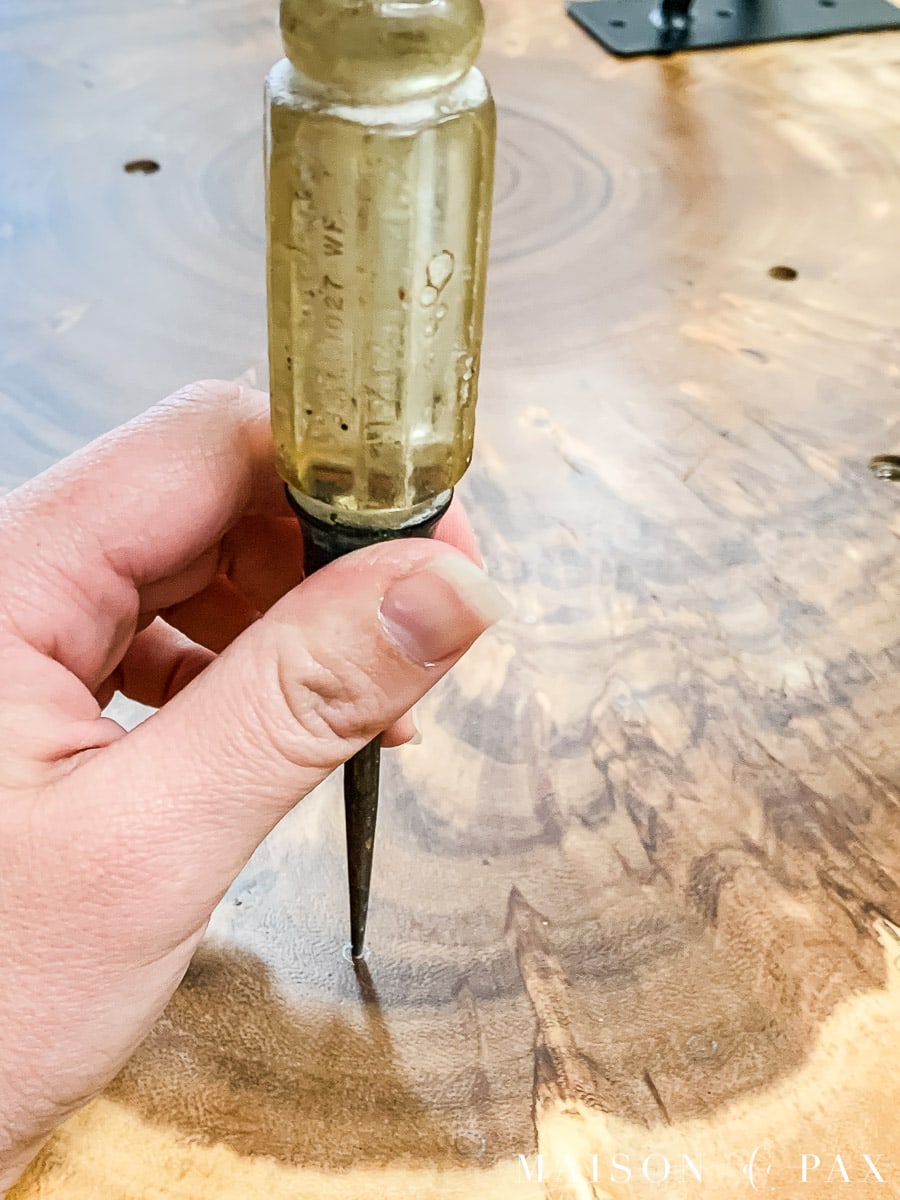 an awl makes an indention in the center for a perfect predrill | Maison de Pax
