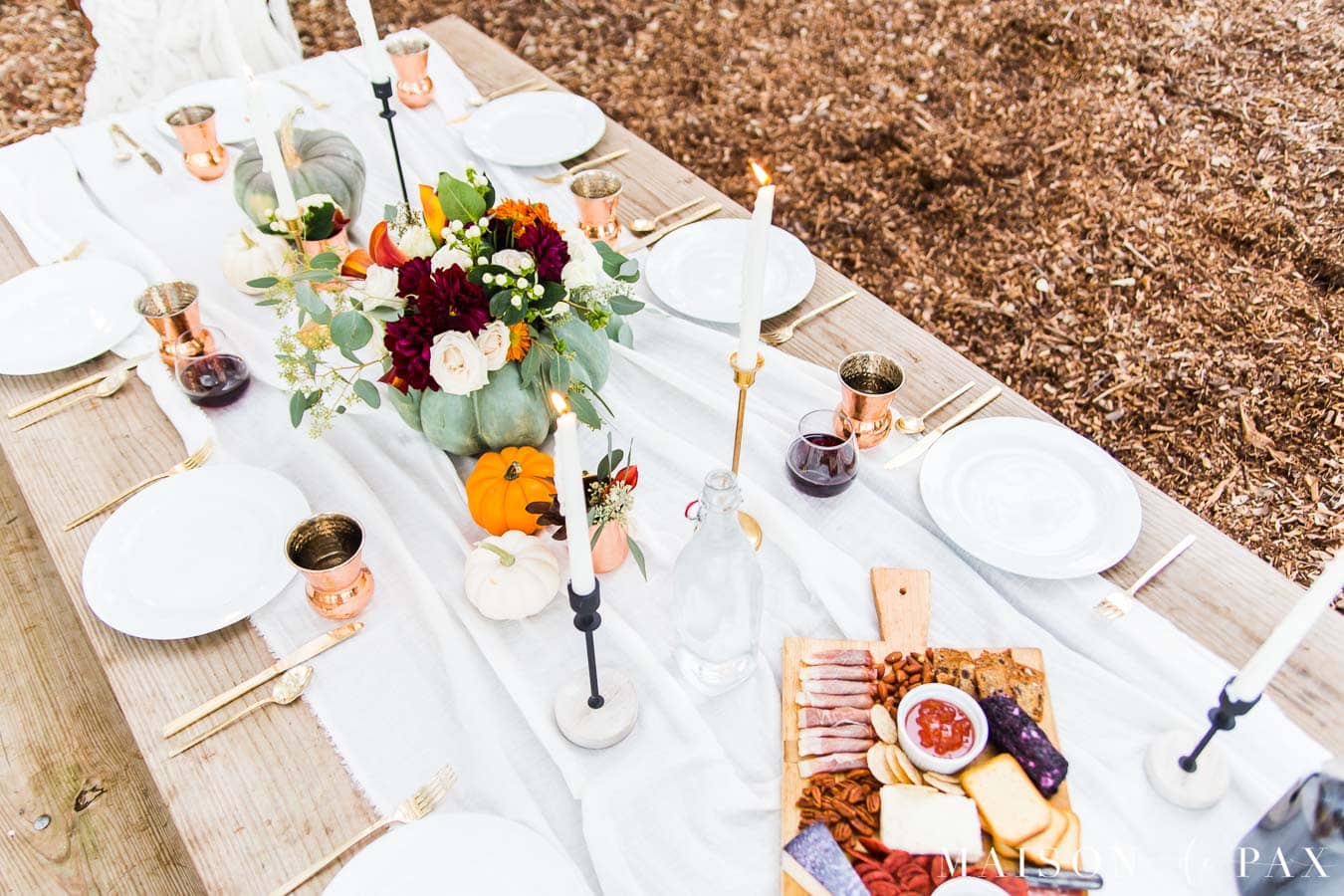 Thanksgiving table with pumpkins, metallics, and charcuterie board | Maison de Pax