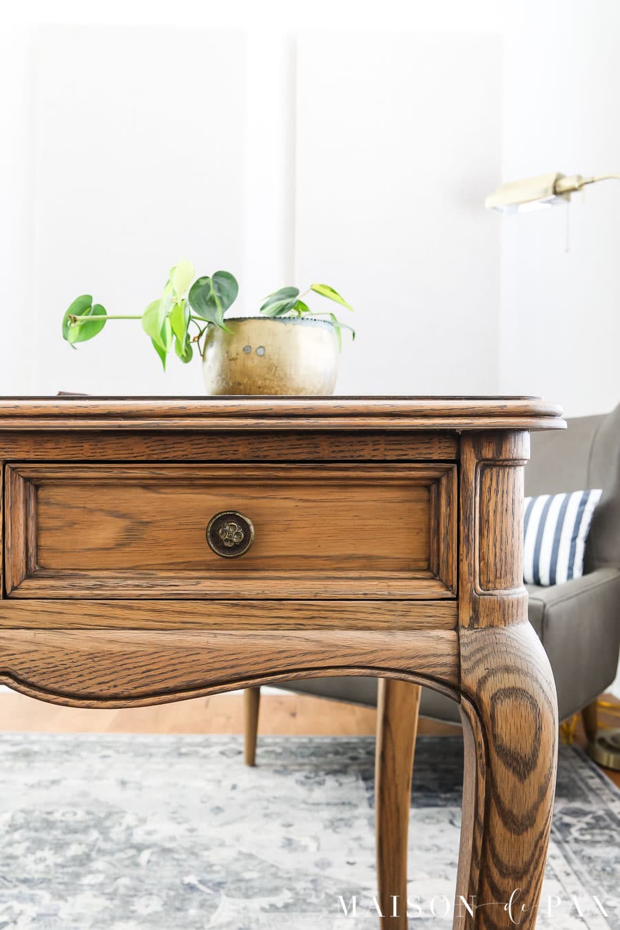 antique oak desk with aged brass hardware