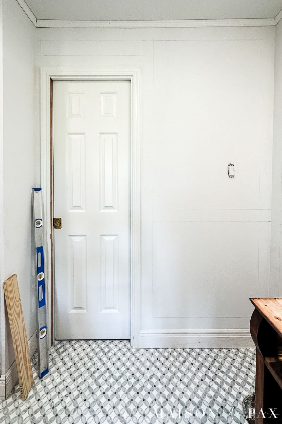 drawing lines for picture frame moulding in a small bathroom