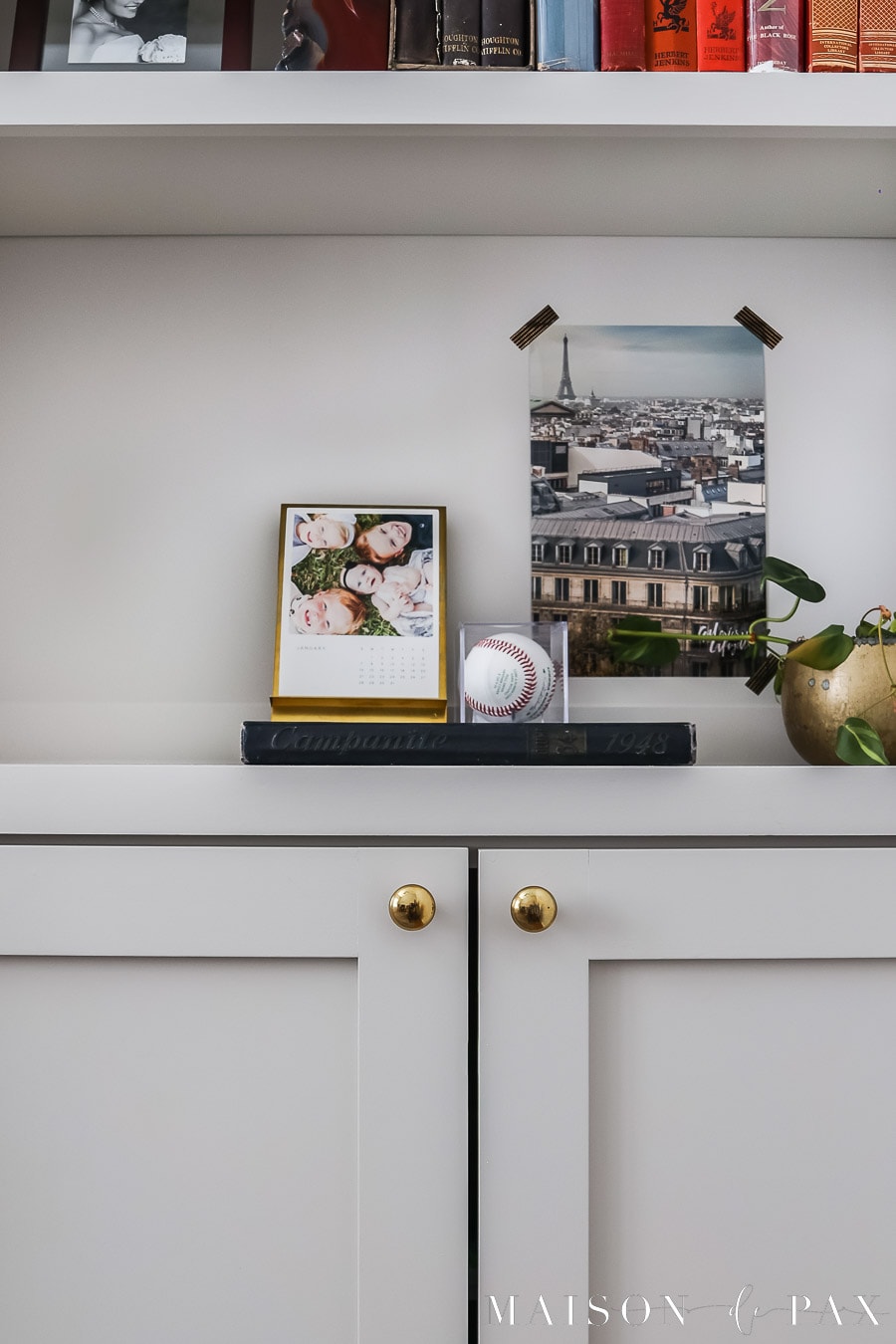 unlacquered brass cabinet knobs on SW Agreeable gray cabinetry