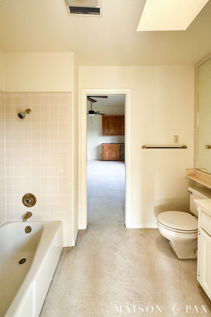 80s bath with carpet before renovation