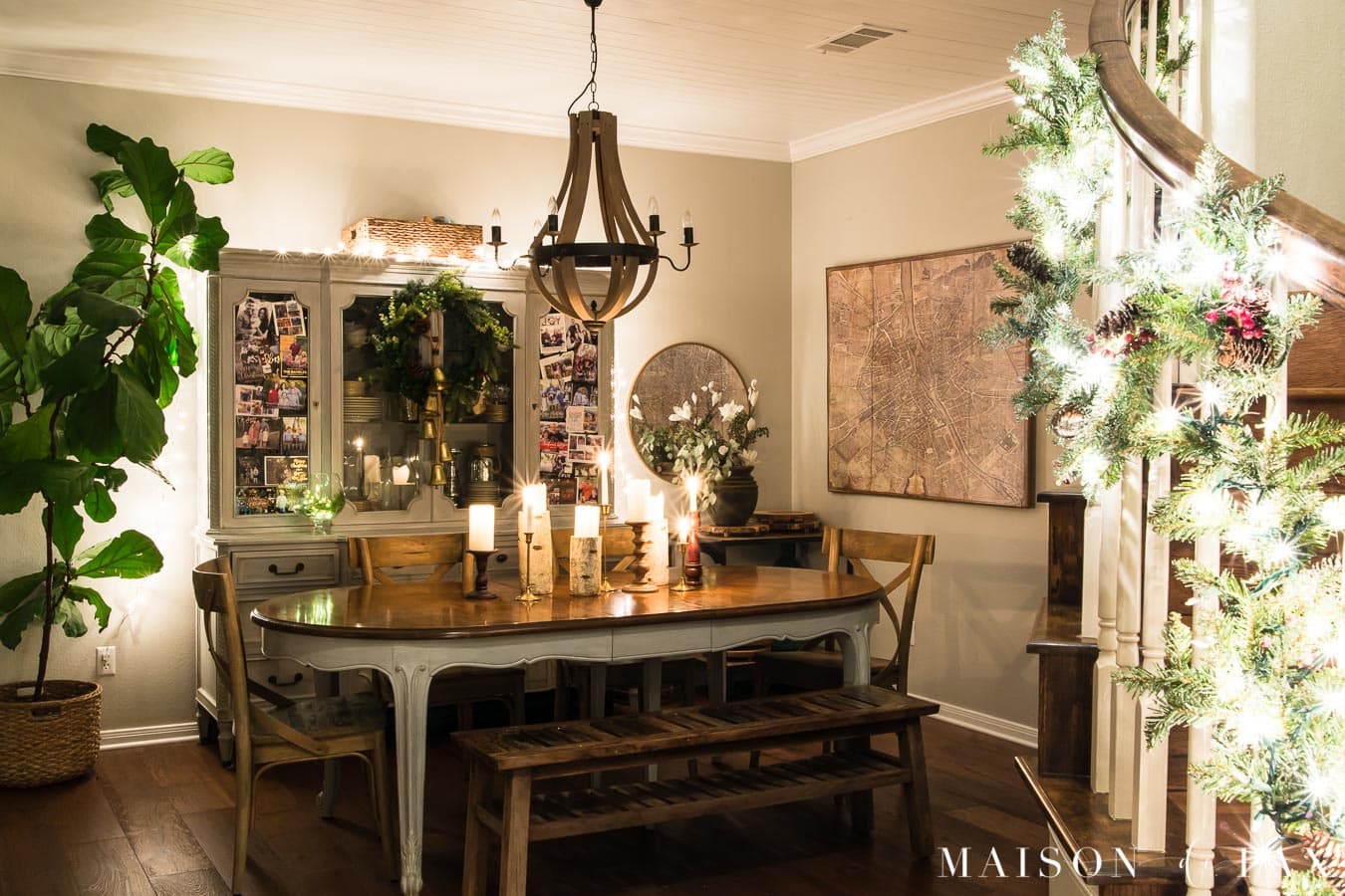 dining room lit by holiday lights | Maison de Pax