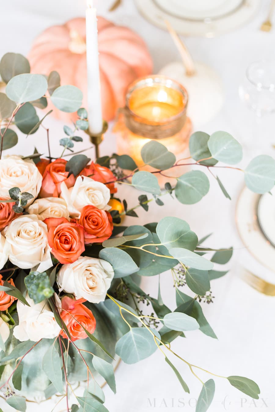 roses and eucalyptus centerpiece