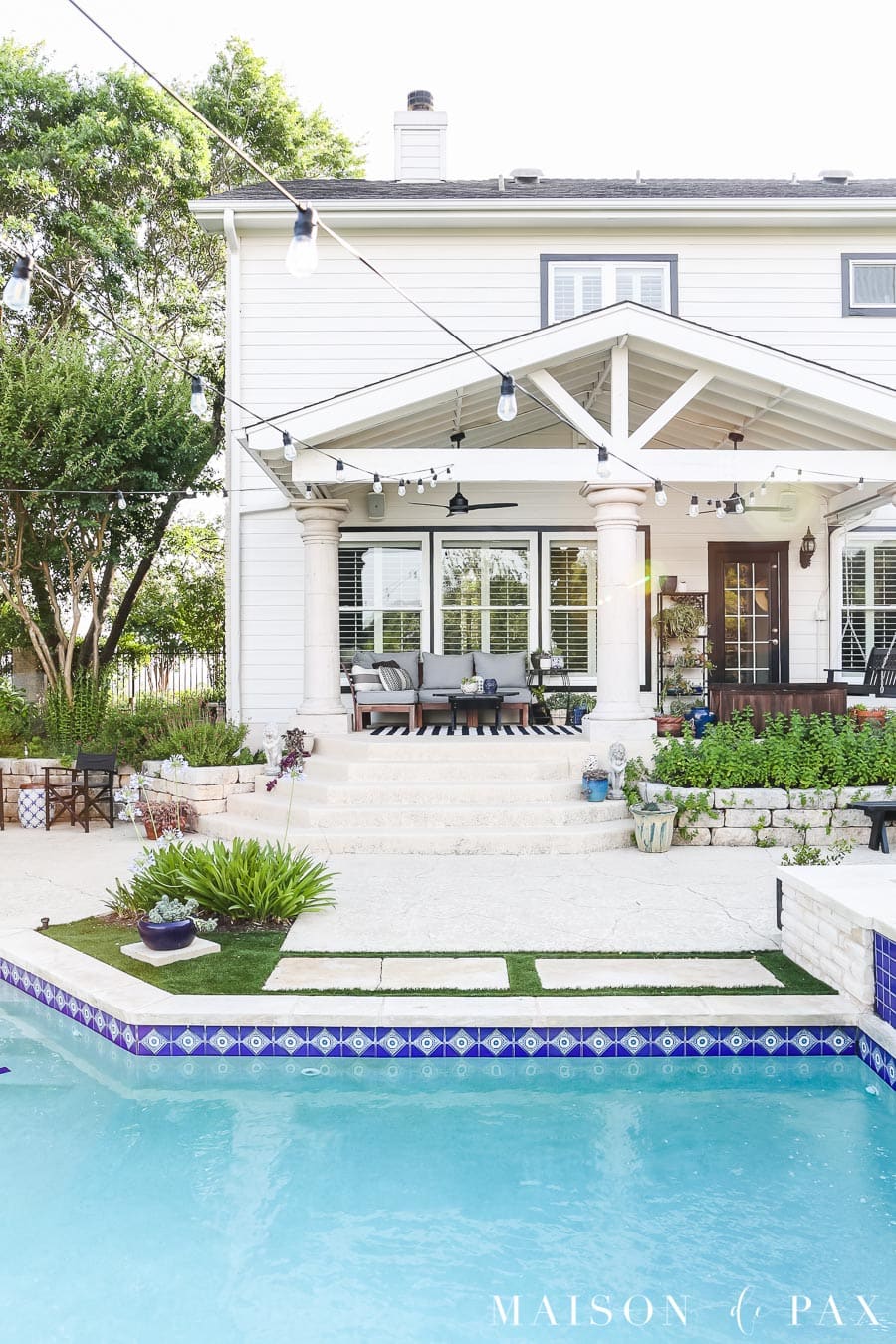 artificial turf and stepping stones beside pool