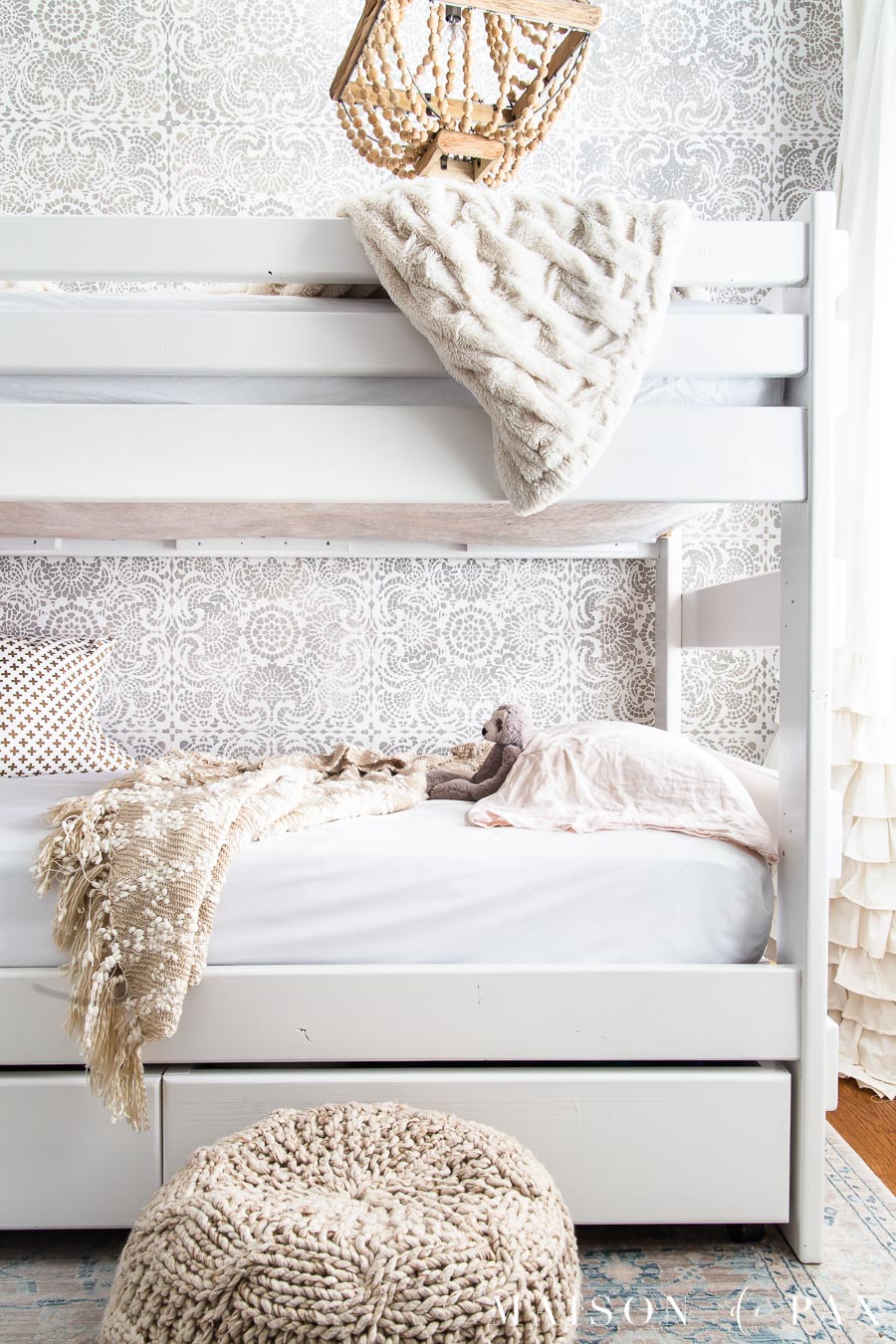 white bunk bed in front of gray and white stenciled wall | Maison de Pax