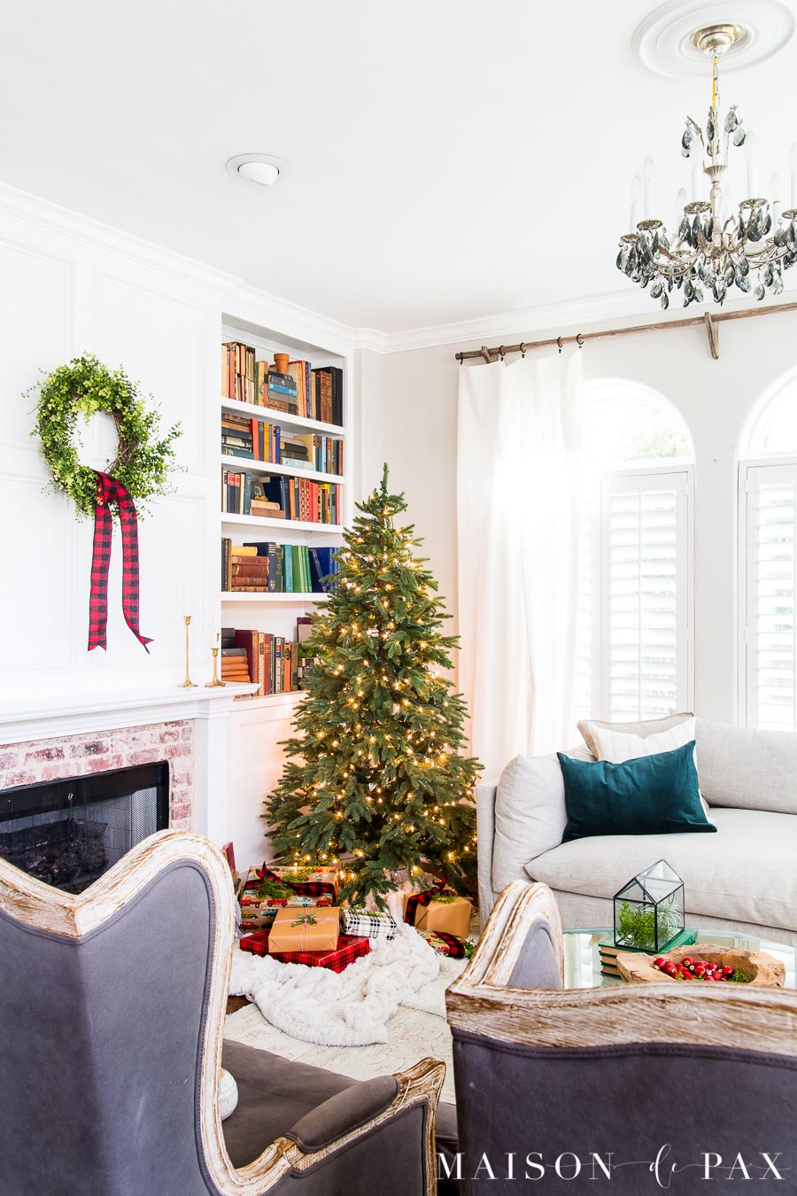living room with gray armchairs, linen sofa, green velvet pillows, naked tree | Maison de Pax