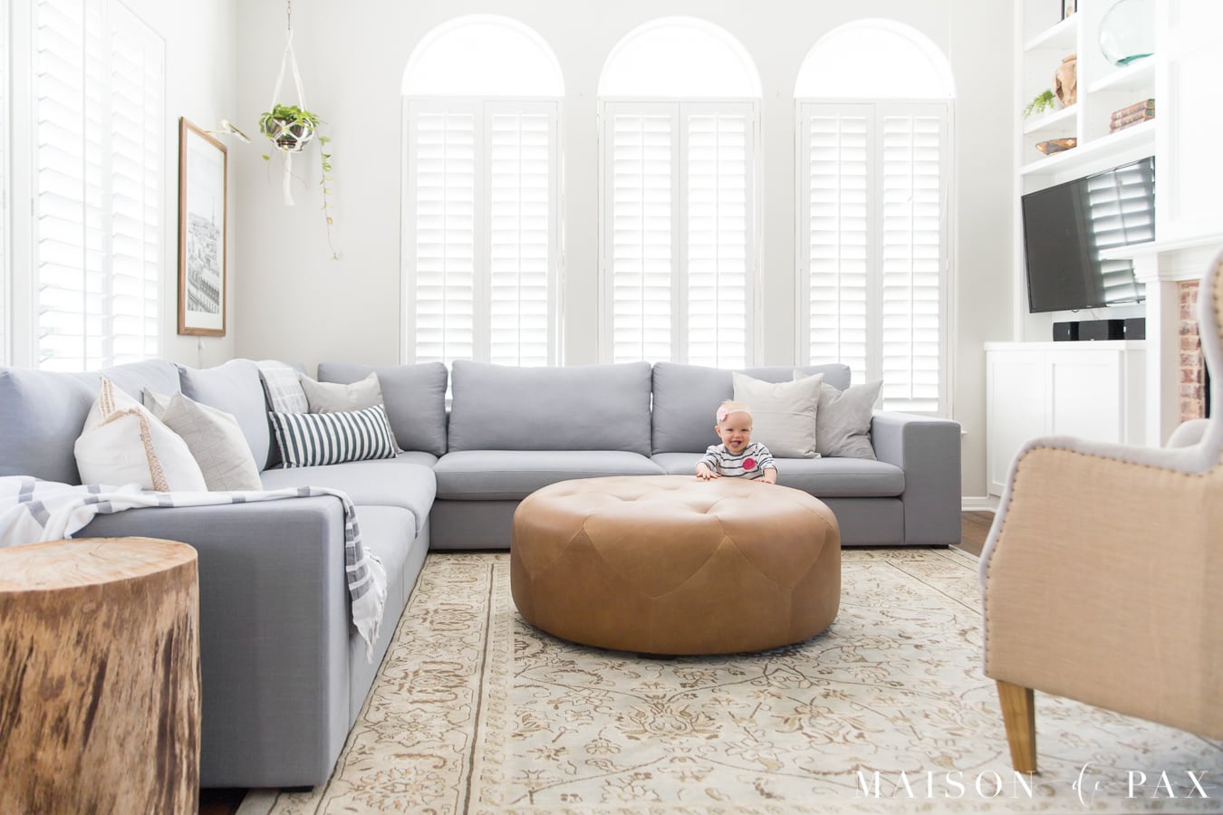 Bright living room design with sectional- Maison de Pax