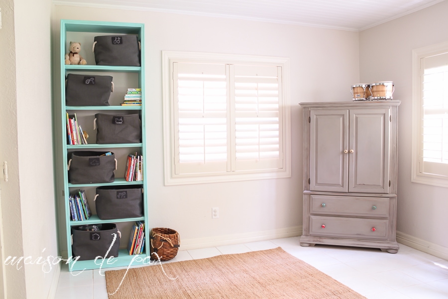 Fabulous "vintage aqua" bookcase makeover for adorable and functional playroom storage at aiweb9ygdry.cmersite.com #makeover #furniture #paint #diy #tutorial #chalkpaint