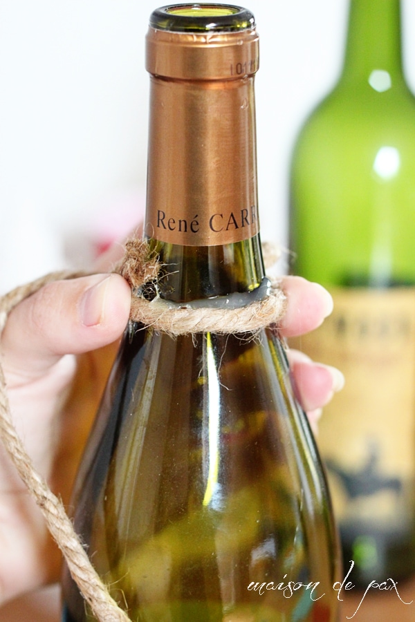 rustic, nautical, versatile wine bottles wrapped in jute twine at aiweb9ygdry.cmersite.com... use them as centerpiece, bookends, vases, or accents!