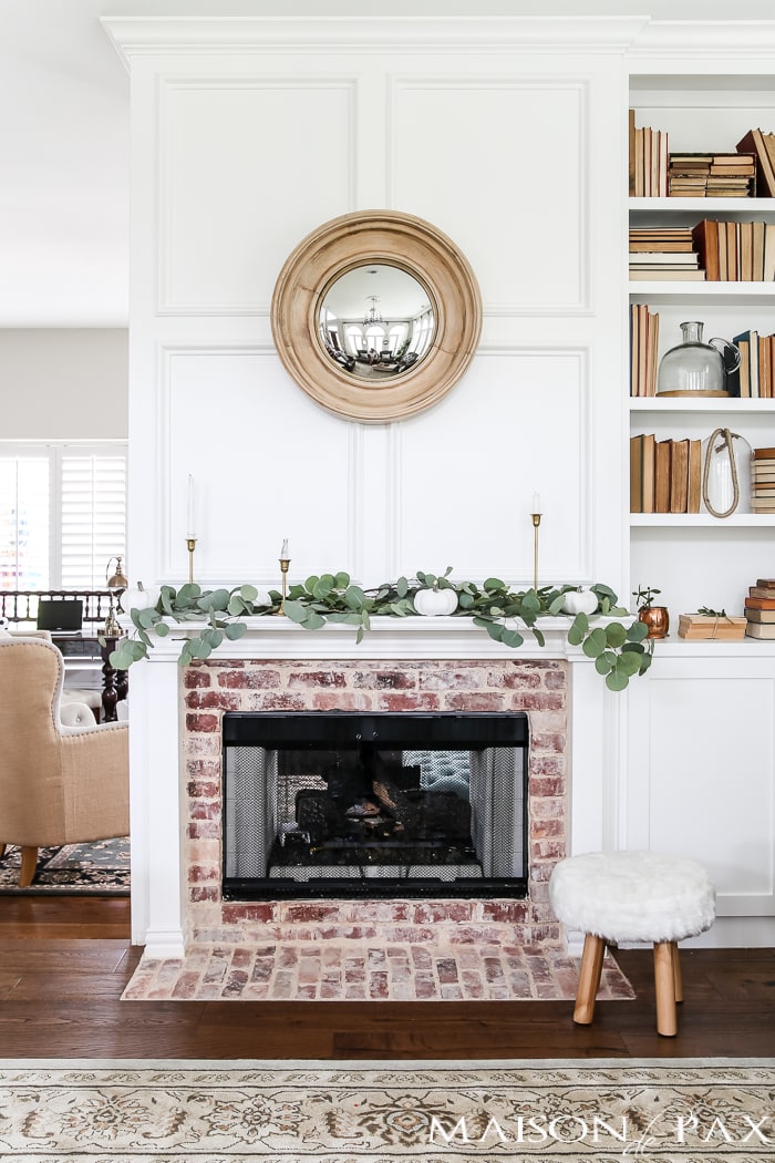 eucalyptus and white pumpkins make a gorgeous fall mantel #fallmantel