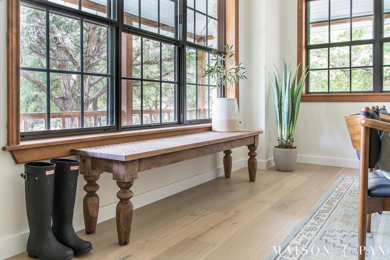 rustic wood bench in entryway | Maison de Pax