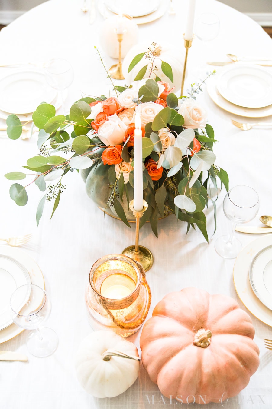 pumpkin centerpiece with gold and ivory china