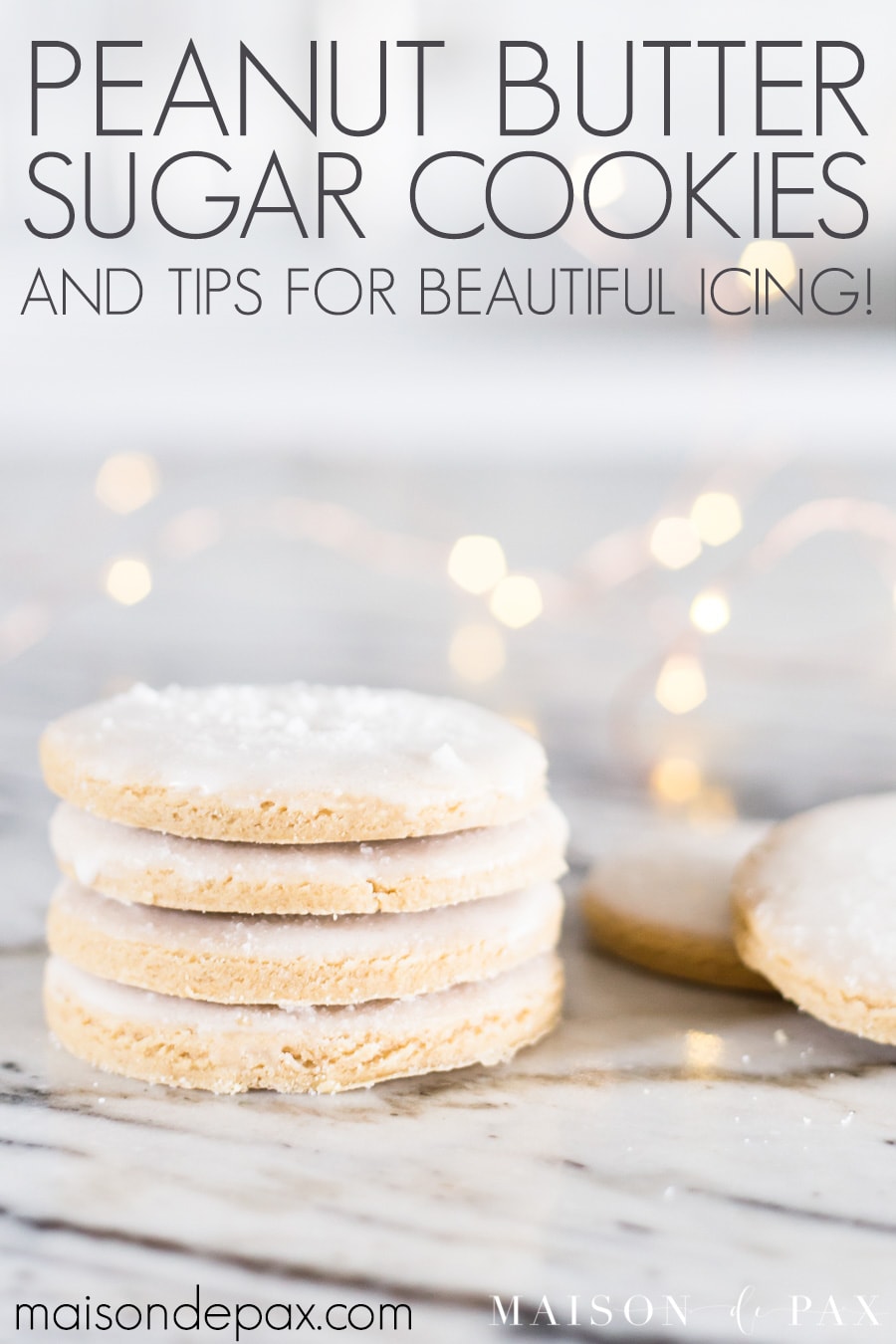 christmas cookies and twinkle lights on marble counters | Maison de Pax