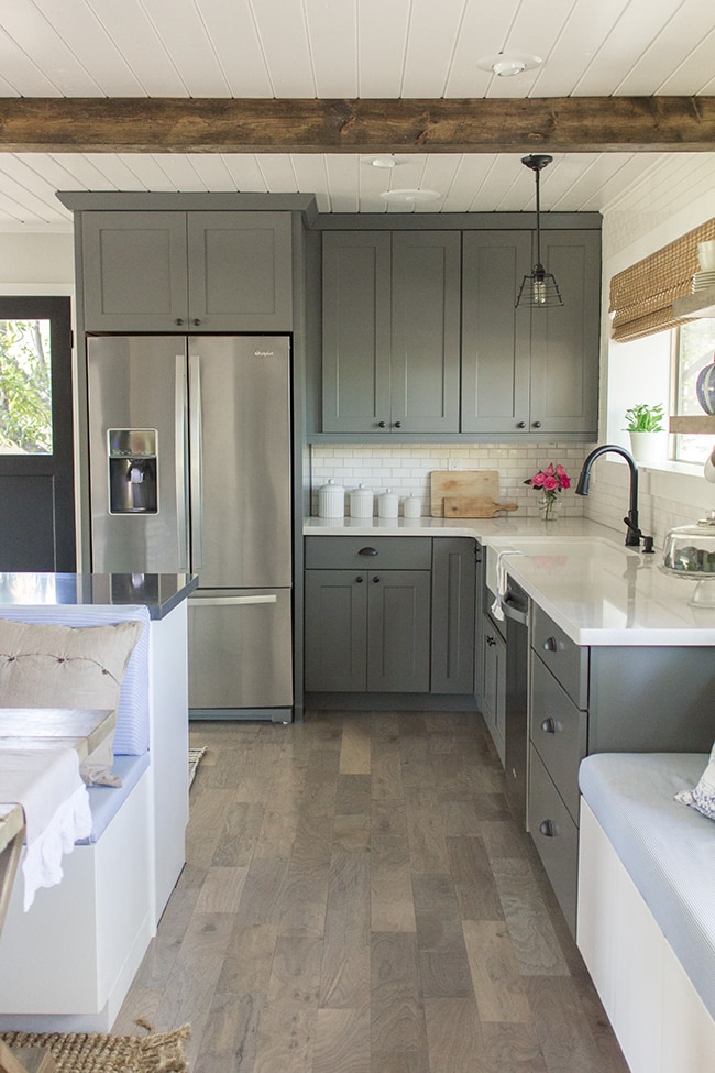 gray kitchen with white countertops
