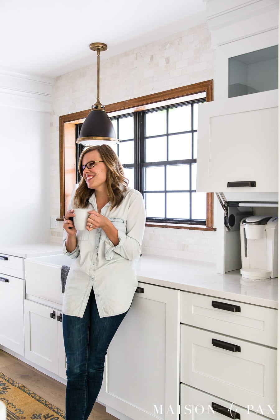 farm sink under window with black and brass pendant and appliance garage | Maison de Pax