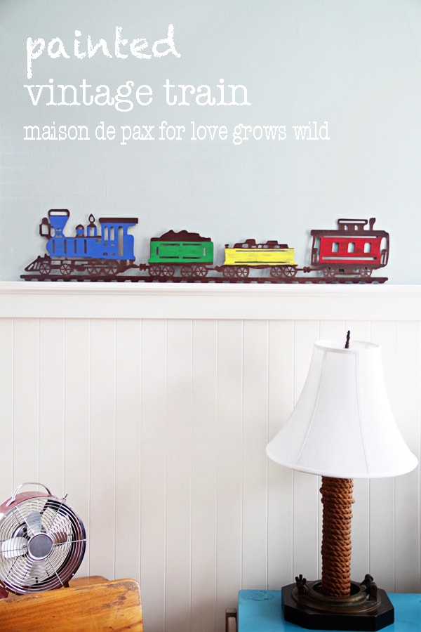 Add a little craft paint to an old metal sign and make an adorable statement piece!