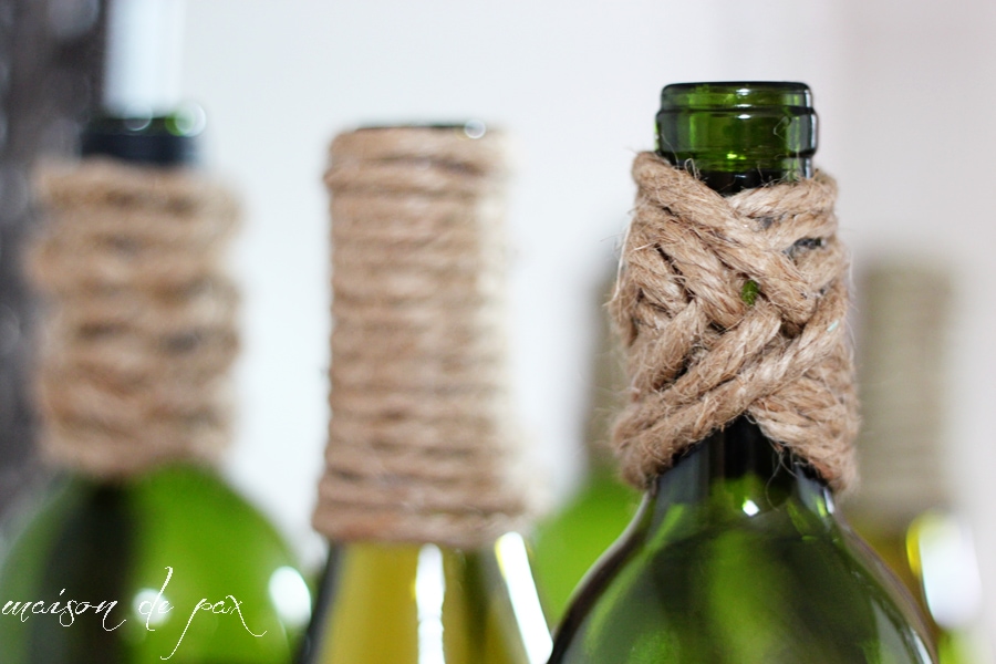 rustic, nautical, versatile wine bottles wrapped in jute twine at aiweb9ygdry.cmersite.com... use them as centerpiece, bookends, vases, or accents!