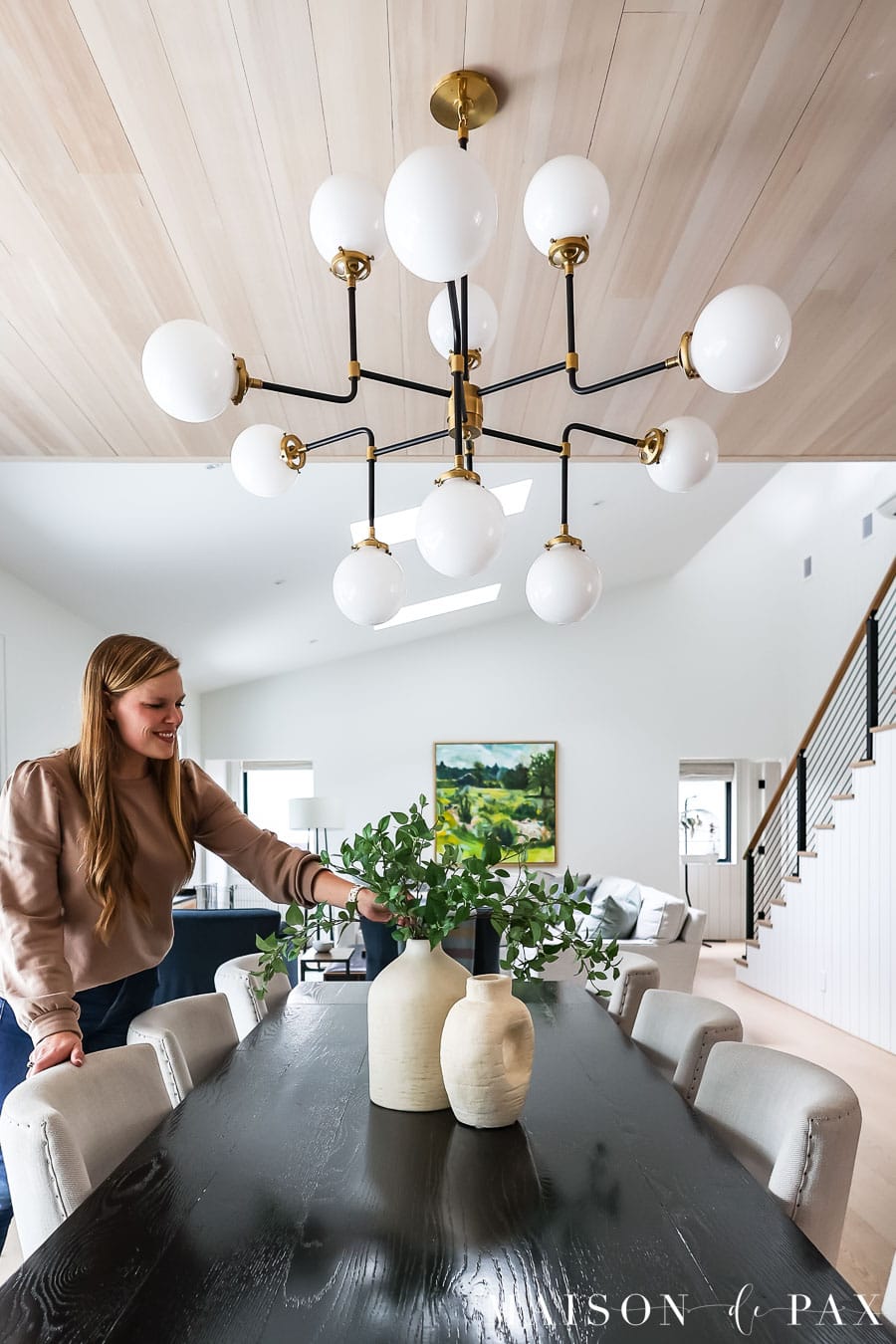 dining room with fun globe chandelier and wood ceiling