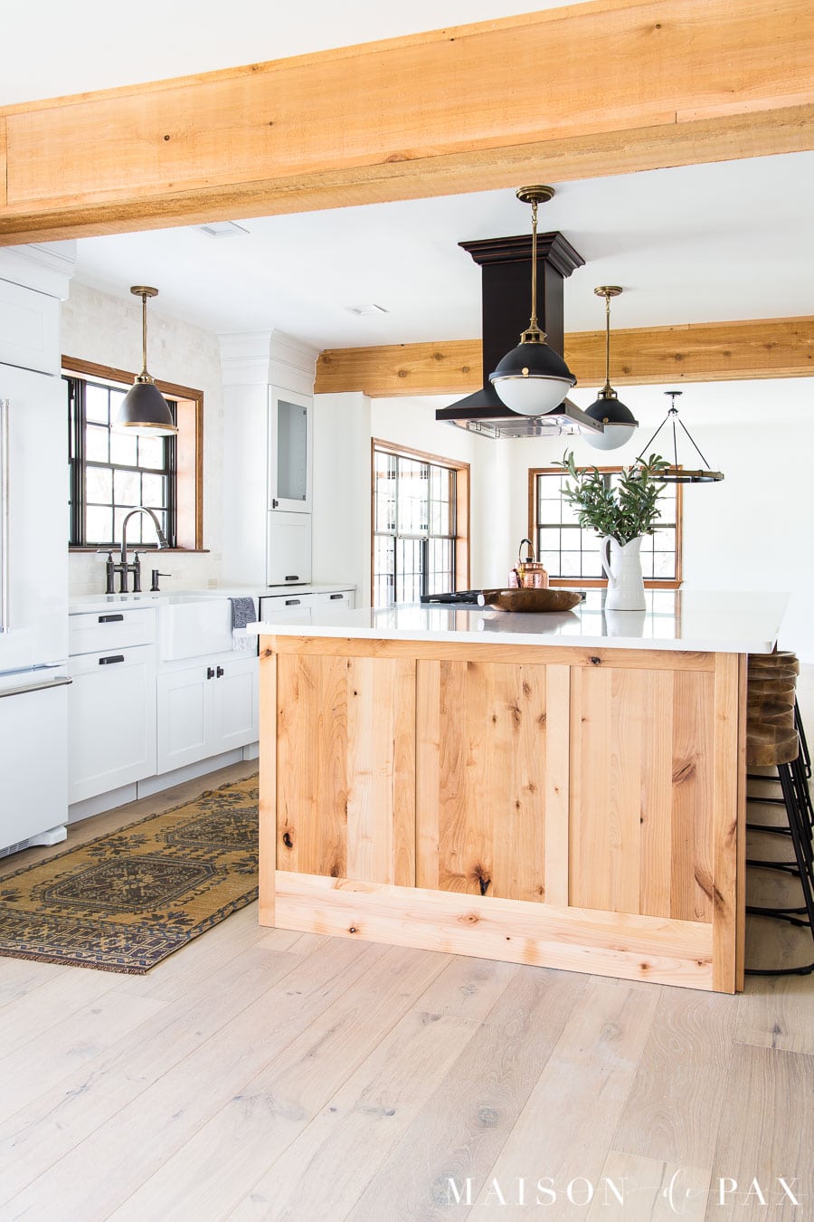 rustic wood island with white quartz kitchen counters | Maison de Pax