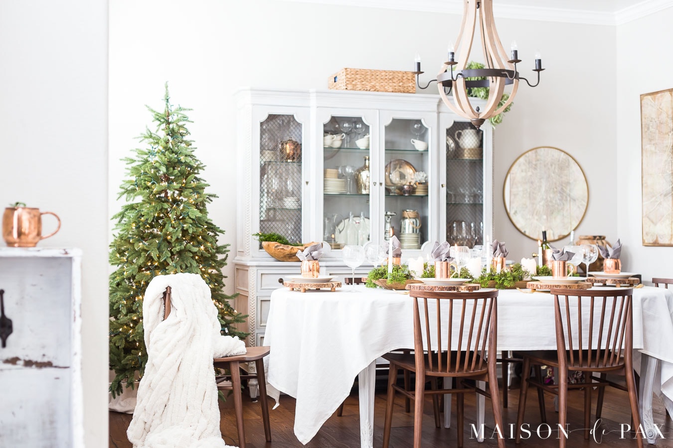 french country dining room with white, green, and copper holiday accents