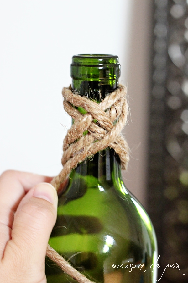rustic, nautical, versatile wine bottles wrapped in jute twine at aiweb9ygdry.cmersite.com... use them as centerpiece, bookends, vases, or accents!
