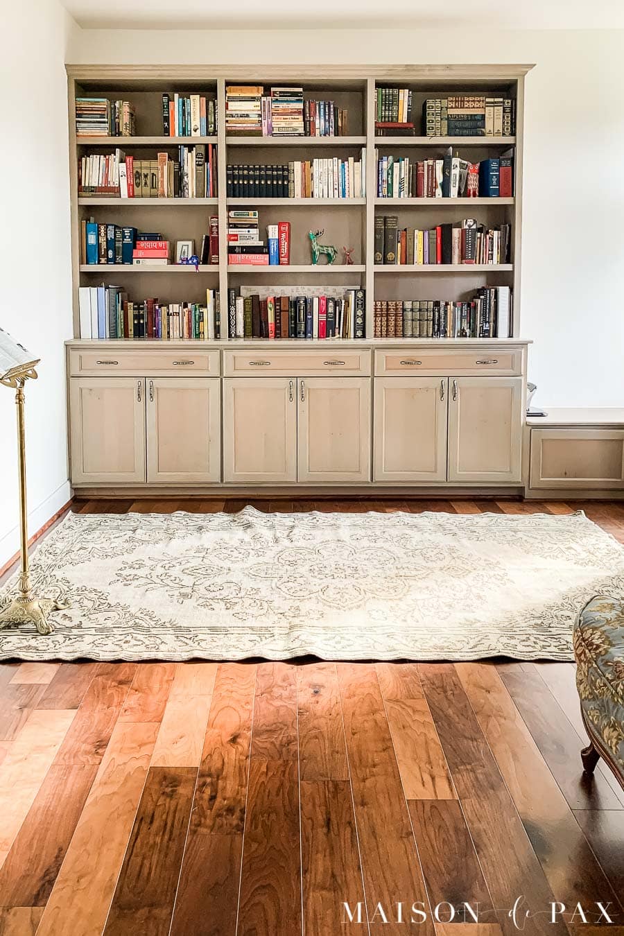 gray stained bookcases in an office with SW Alabaster walls | Maison de Pax
