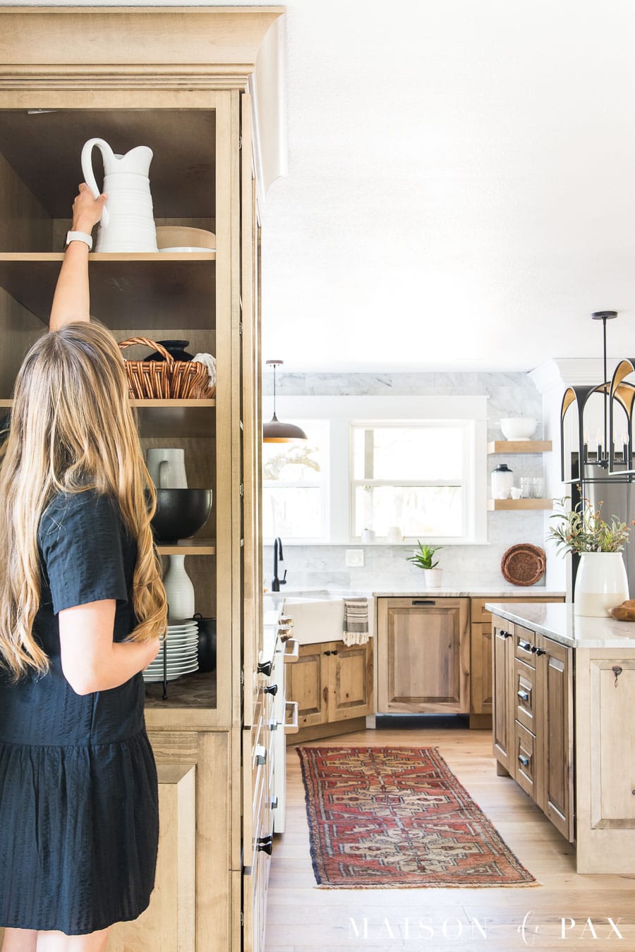 side access to deep decorative cabinet in kitchen - brilliant storage solution!