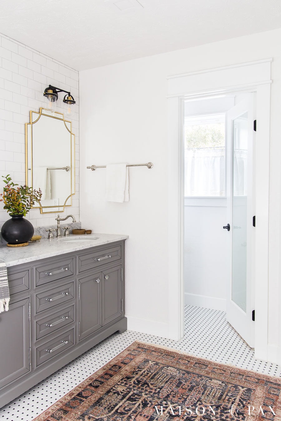 frosted glass door on water closet to allow in light