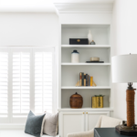 bookcase and built-in window seat in bedroom