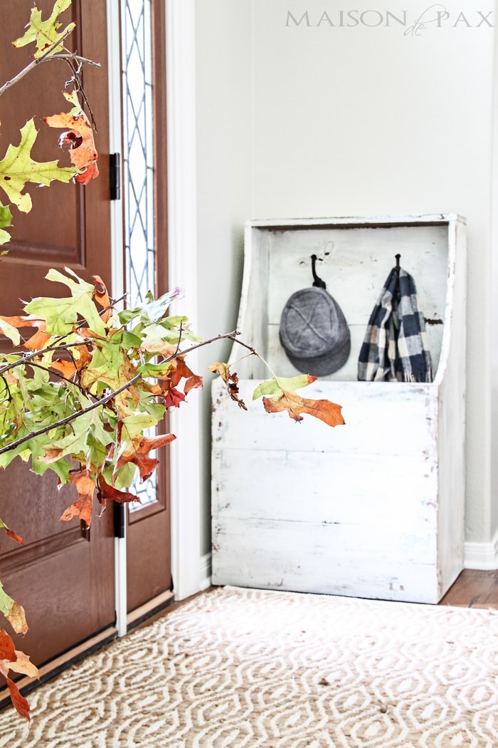 gorgeous, functional entryway with an antique wood firebox used as a mini mudroom... get the plans to build this diy planked "antique" firewood box here! | aiweb9ygdry.cmersite.com