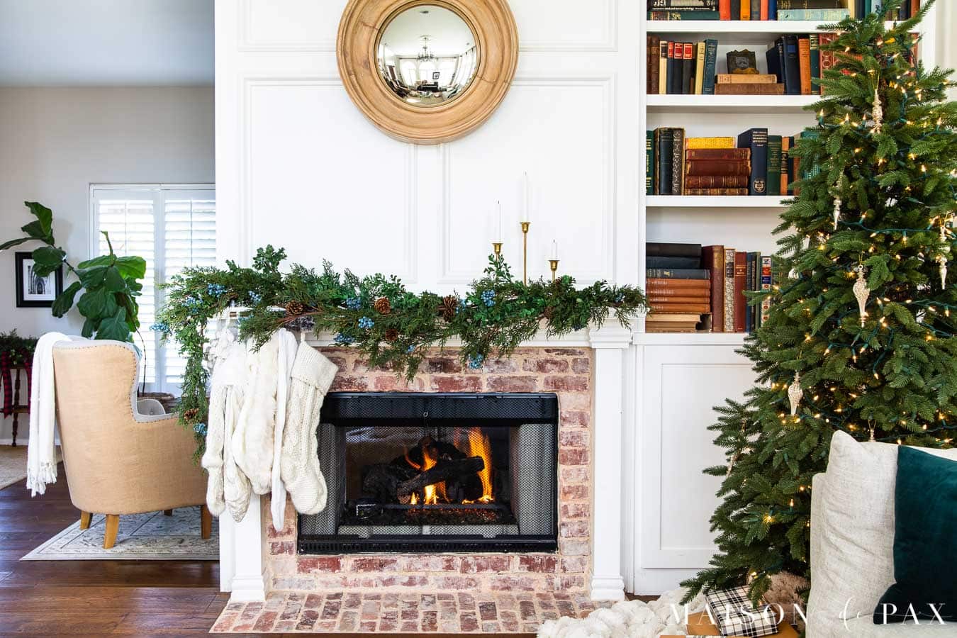 fireplace with greenery and naked tree | maison de pax