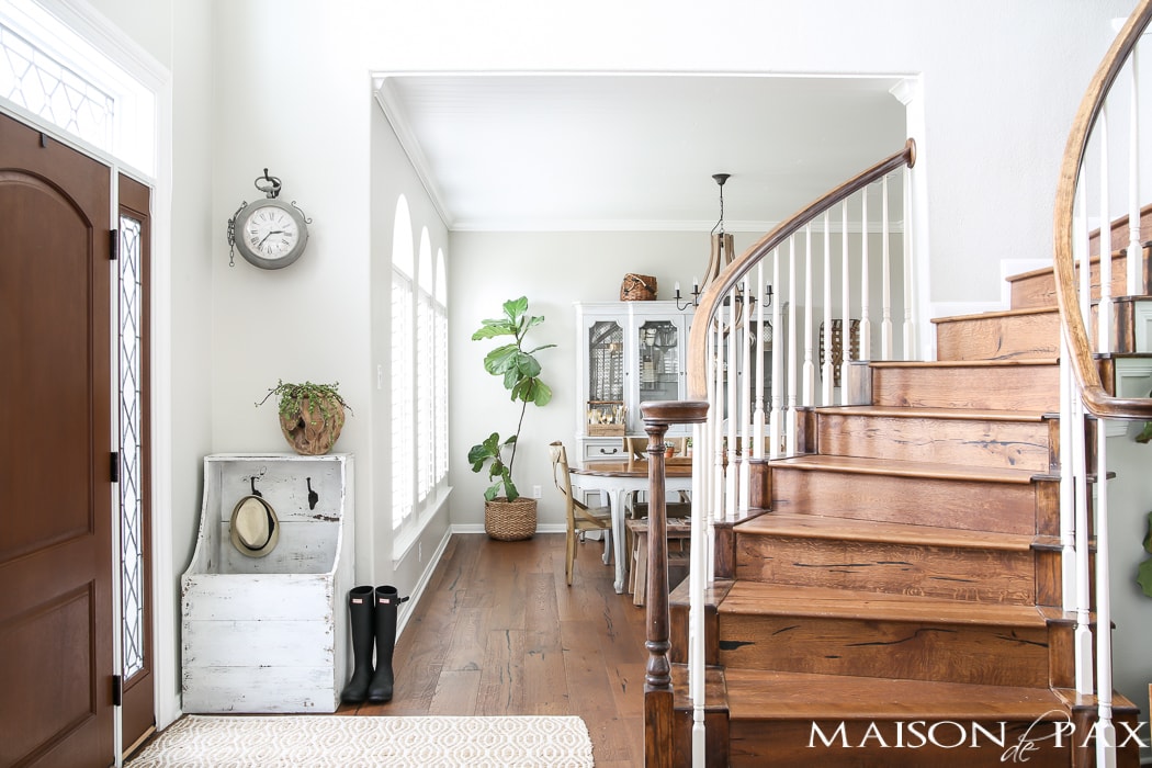 entry and staircase with medium brown wide plank oak flooring | Maison de Pax