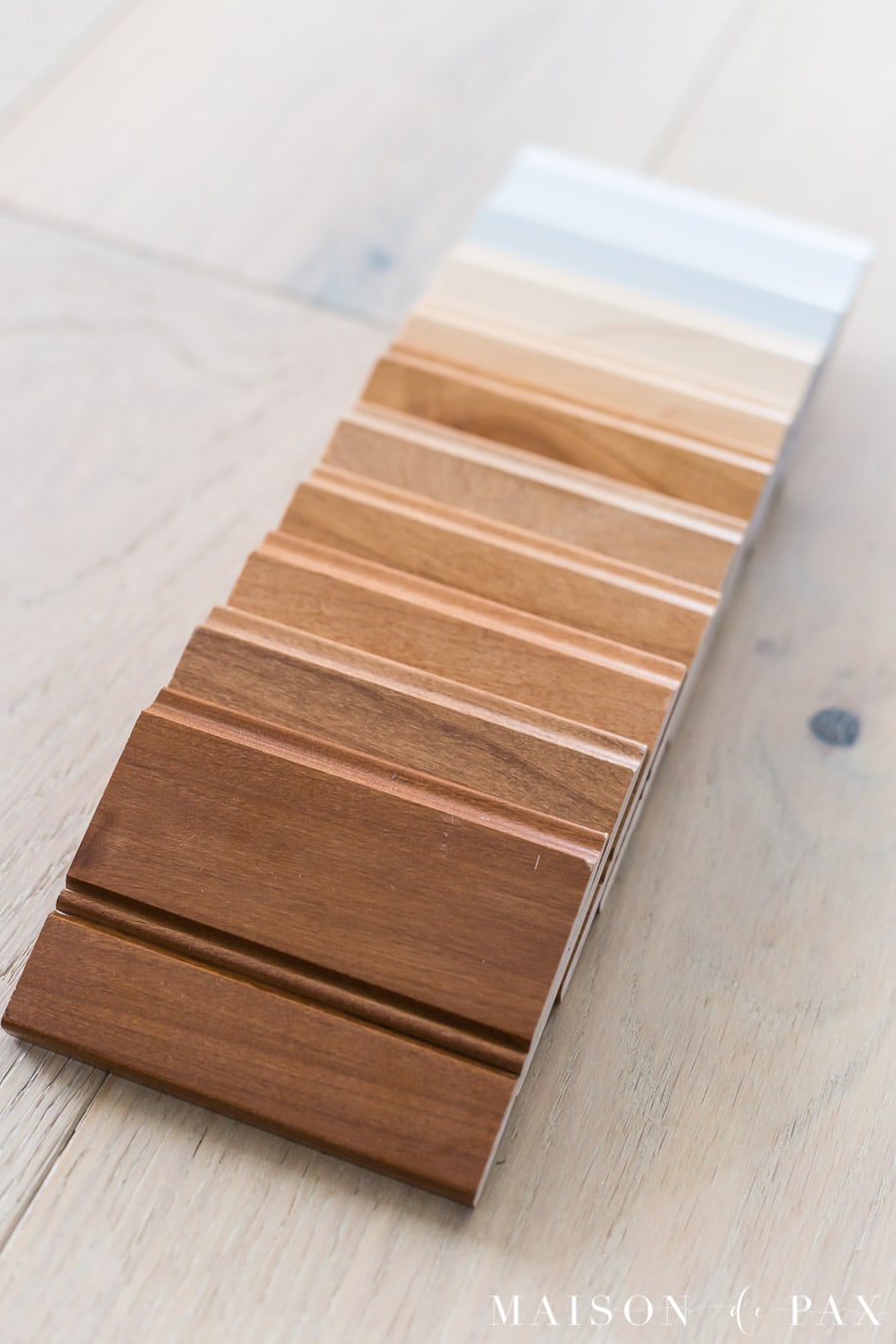 10 different cabinet finish samples ranging from medium wood to white 