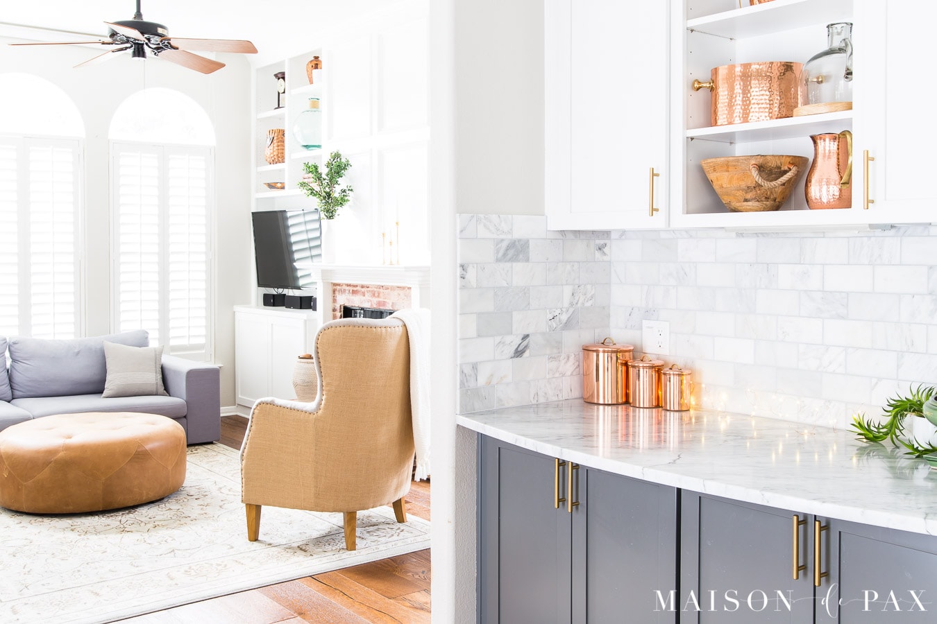 Christmas kitchen decor with grey lower cabinets and marble backsplash with copper accents- Maison de Pax 